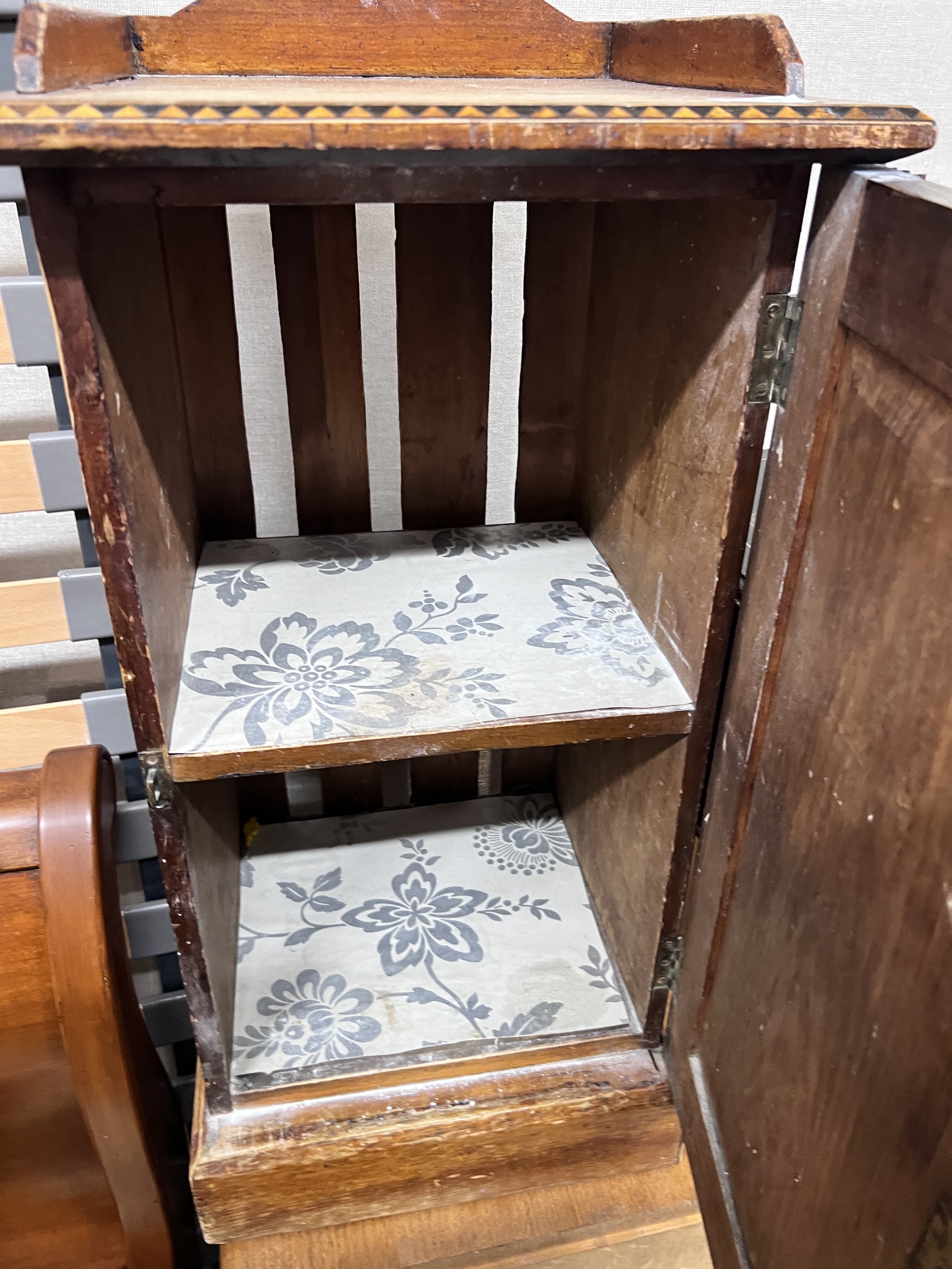 A late Victorian inlaid pine bedside cabinet, width 38cm
